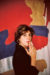 Frankenthaler stands in front of Sands (in progress) in her studio in New York in 1964.